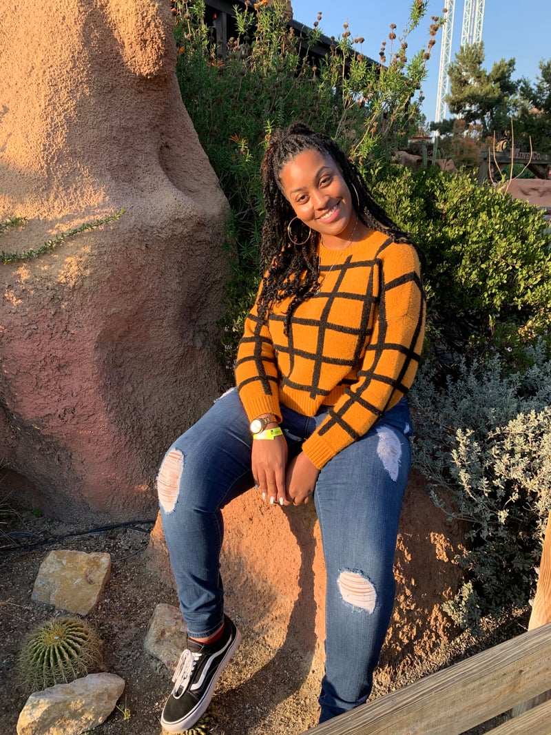 Alissa Young smiling while seated in a bright, welcoming office